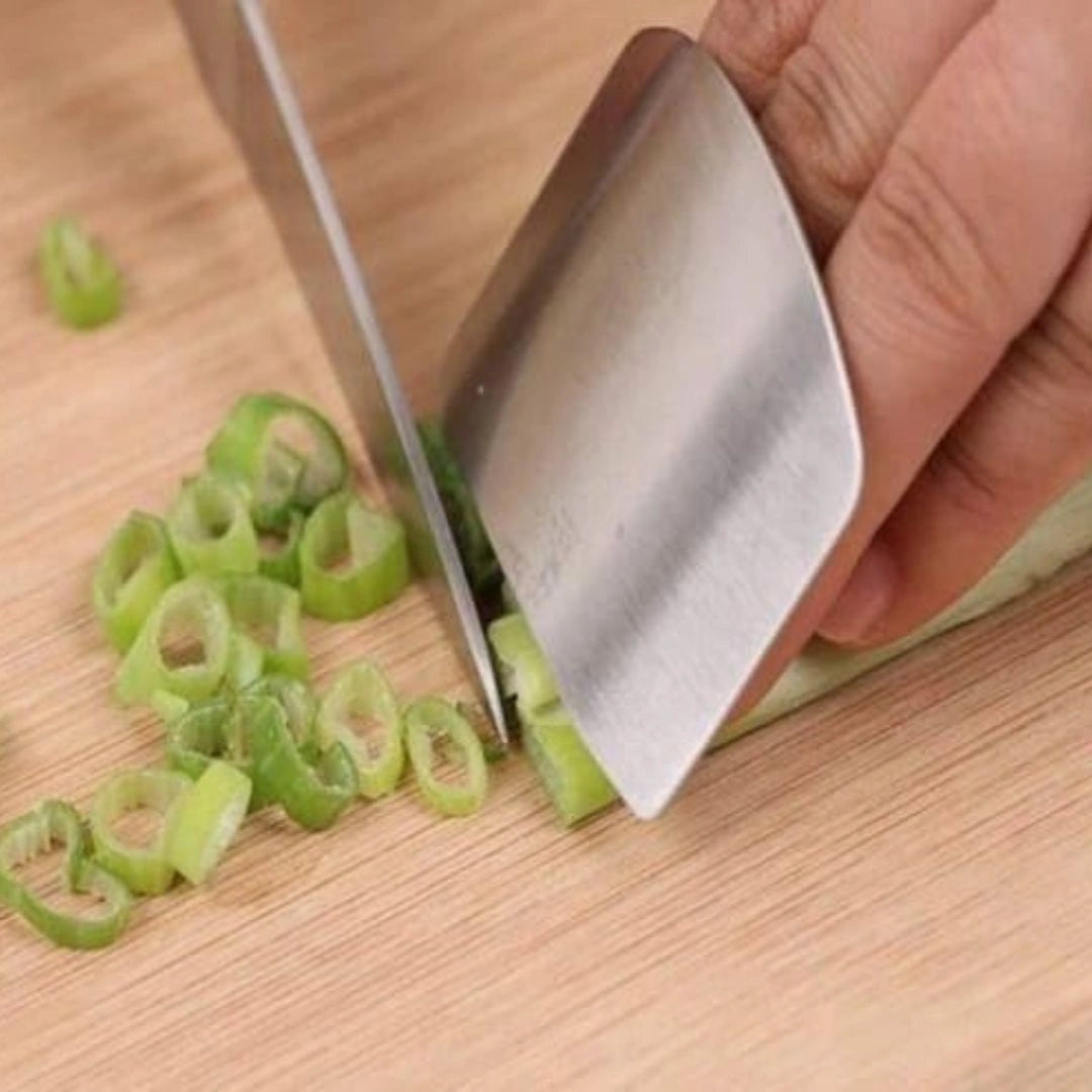 Finger guard protecting while slicing vegetables