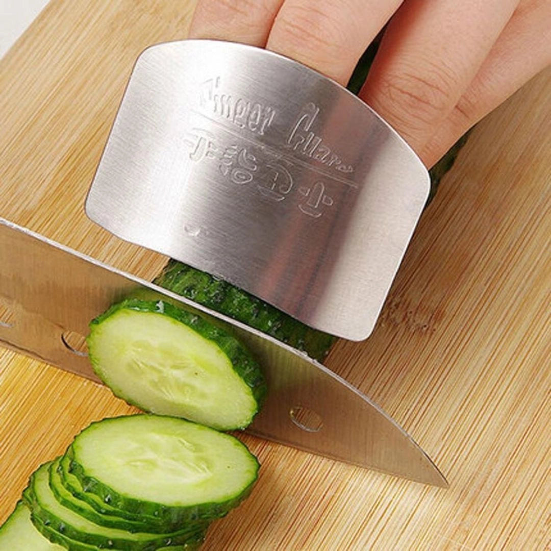 Close-up of steel finger guard on hand